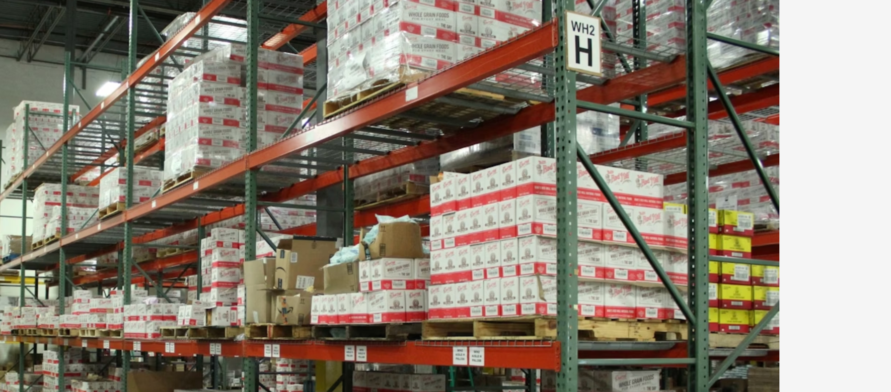 Warehouse shelving and palletized inventory